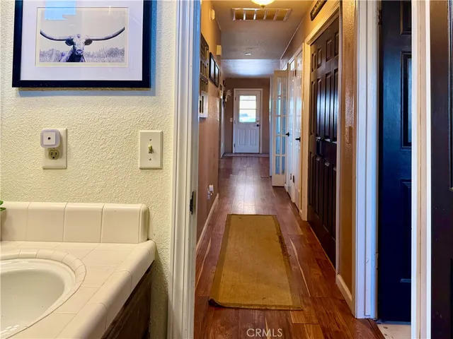a bathroom with a tub and sink