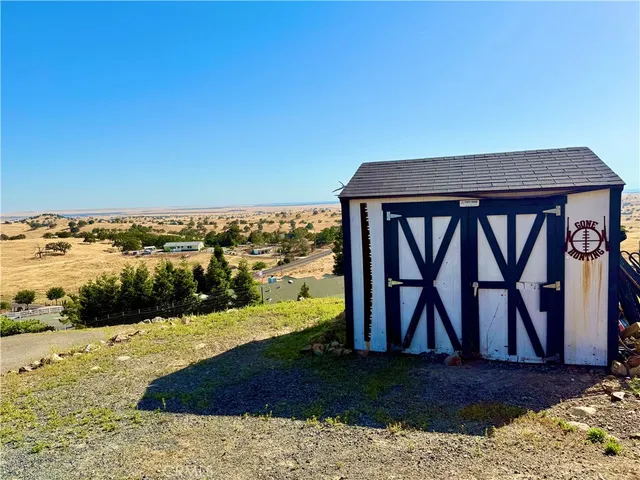 a view of swimming pool with a yard