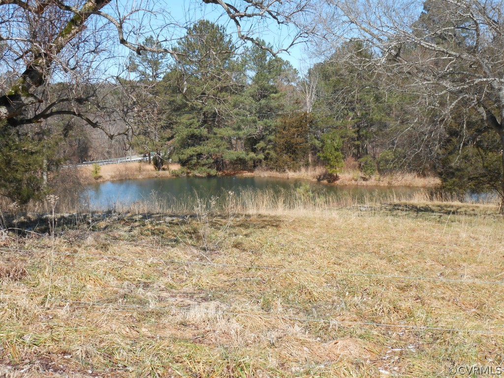 2989 The Falls Road Crewe, VA 23930 - Photo 13 of 17 a view of a lake with a mountain