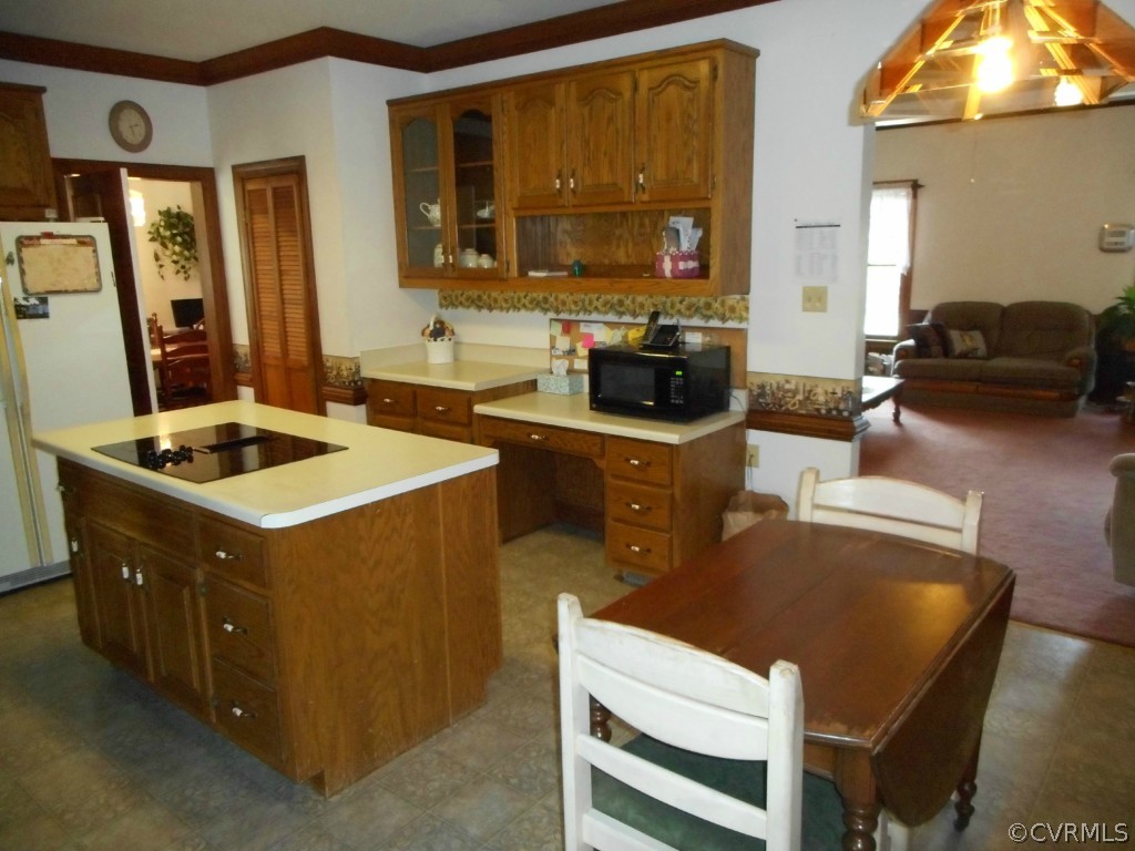 2989 The Falls Road Crewe, VA 23930 - Photo 8 of 17 a kitchen that has a sink and a stove in it