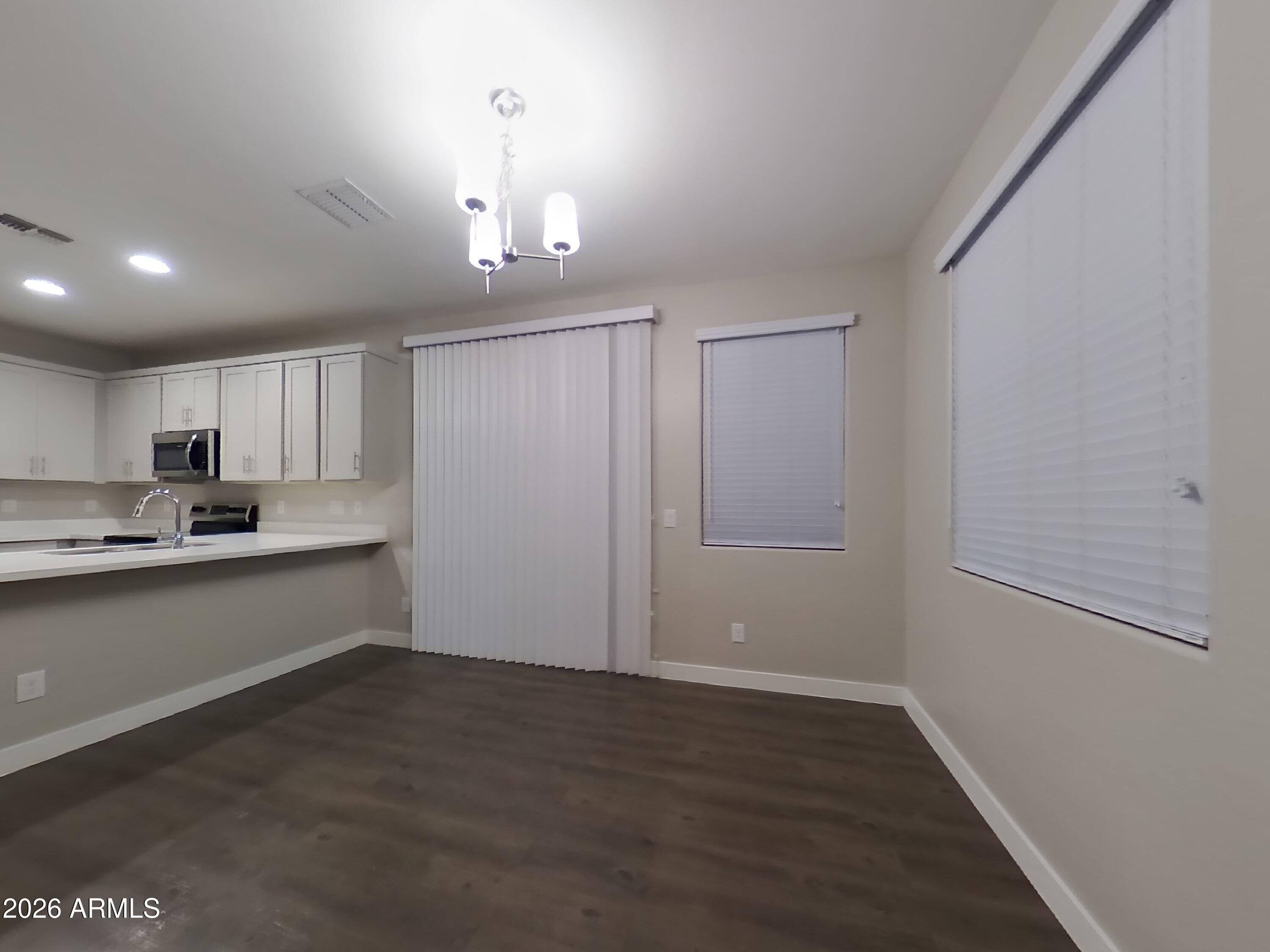 2929 North 28th Street, Unit 9 Phoenix, AZ 85016 - Photo 2 of 16 a view of a kitchen with a sink and dishwasher kitchen view
