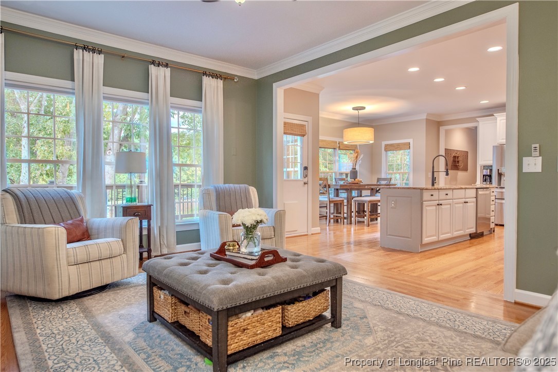 218 Waterville Street Raleigh, NC 27603 - Photo 15 of 49 a living room with furniture and a table
