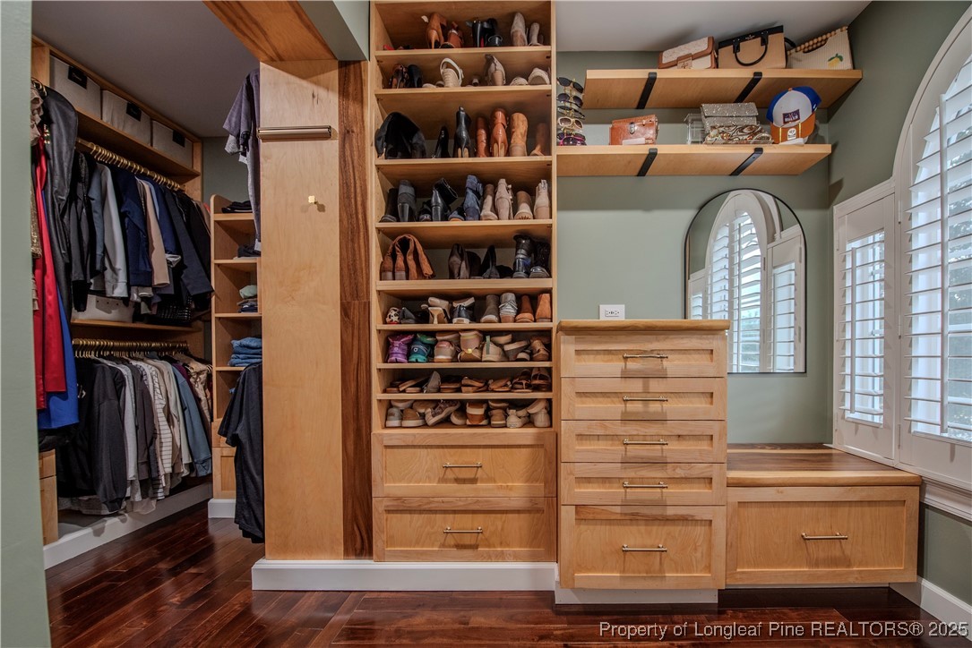 218 Waterville Street Raleigh, NC 27603 - Photo 27 of 49 a view of walk in closet with clothes and shoes
