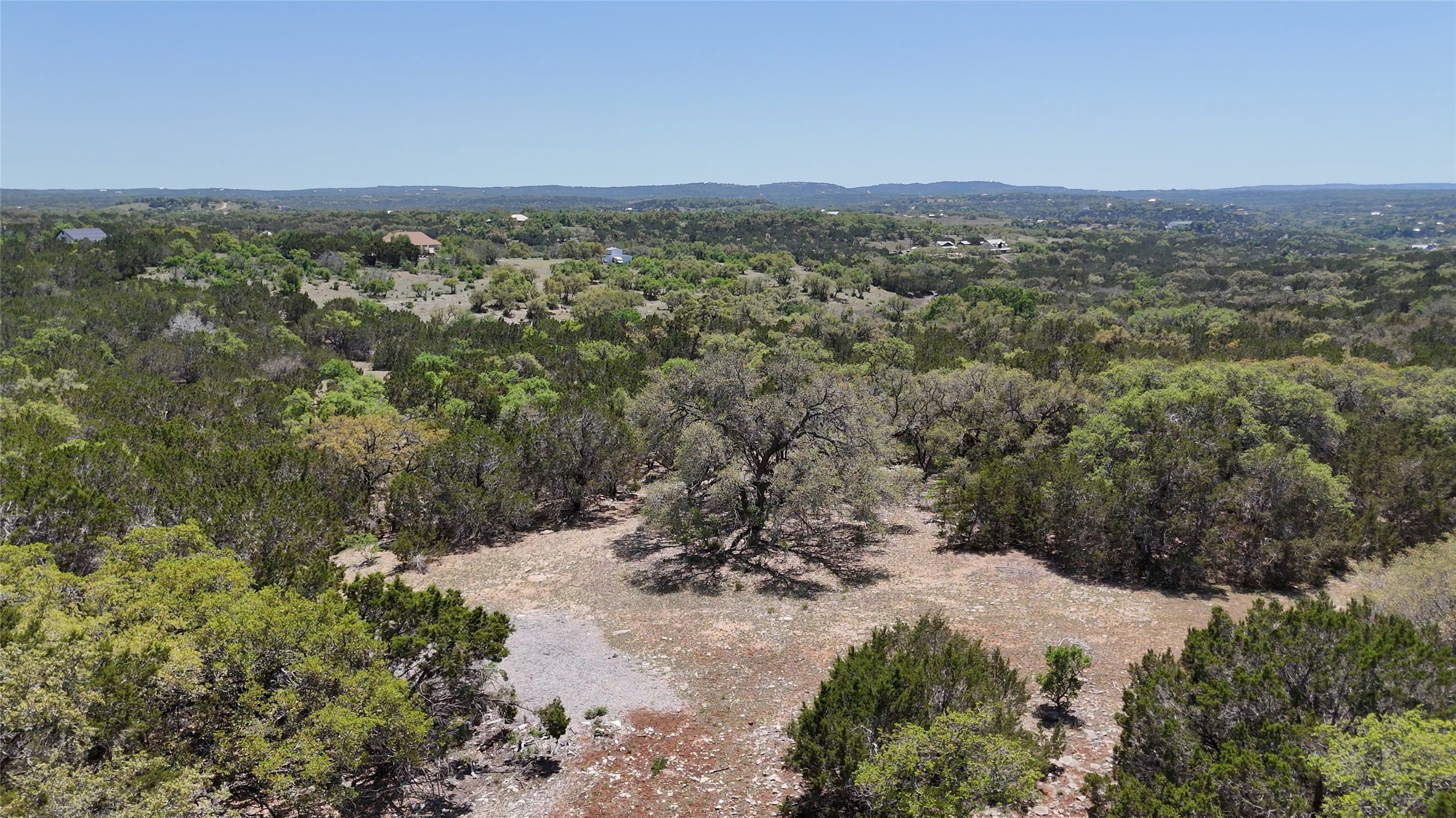 8201 West Fitzhugh Road Dripping Springs, TX 78620 - Photo 2 of 9 a view of a big yard