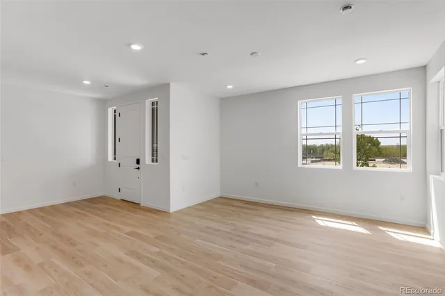 a view of kitchen with wooden floor