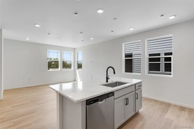 a bathroom with a sink and a window