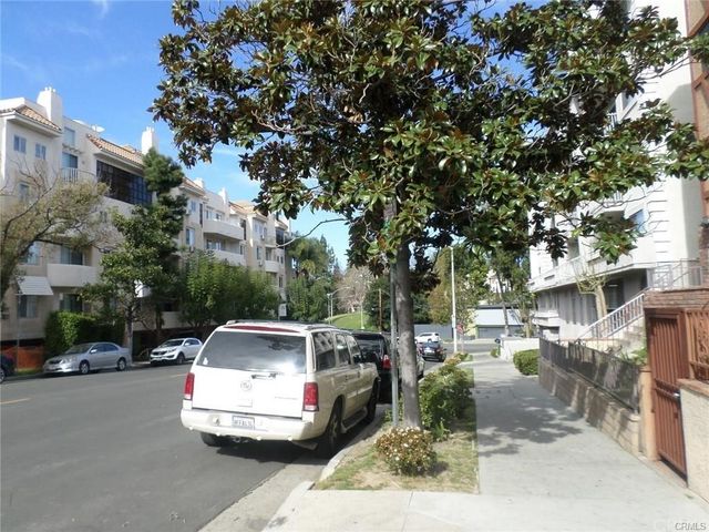 a car parked in front of a building