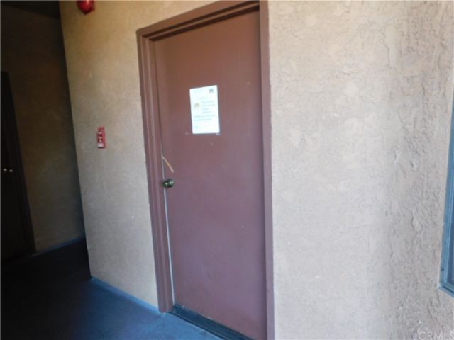 a view of a storage & utility room with washer and dryer