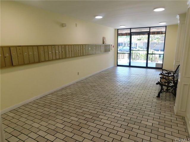 a view of a swimming pool with a lounge chairs