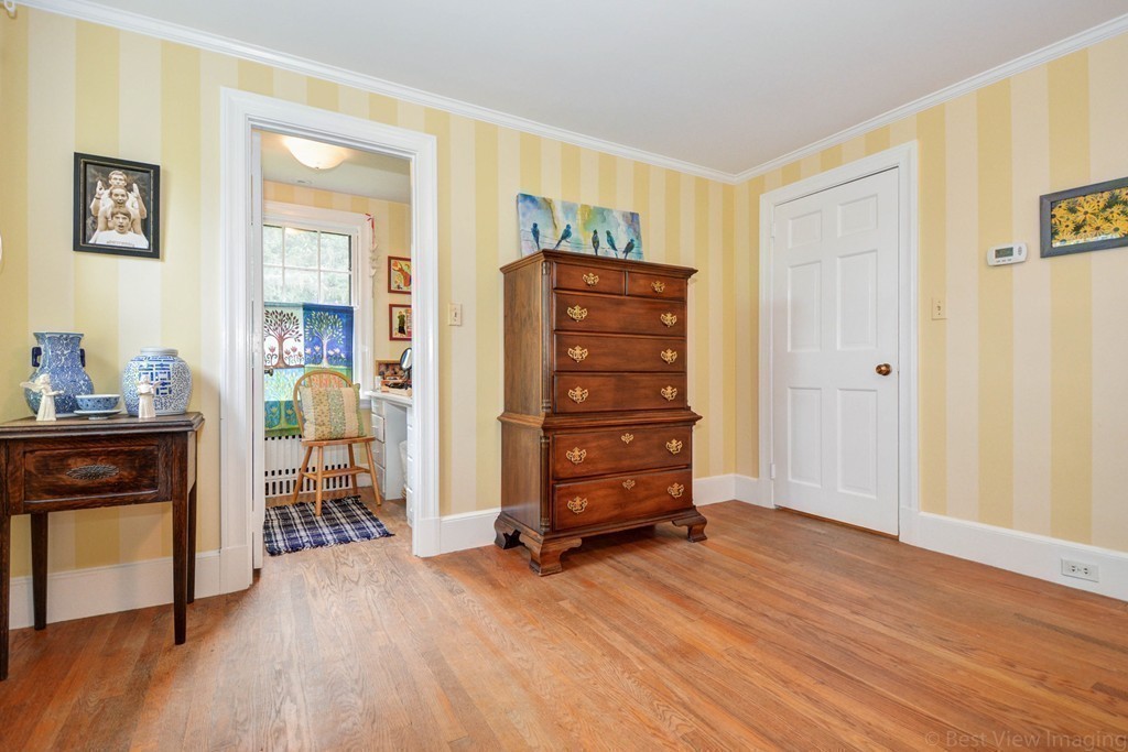 85 Forbes Road Milton, MA 02186 - Photo 16 of 30 a view of livingroom with furniture and wooden floor