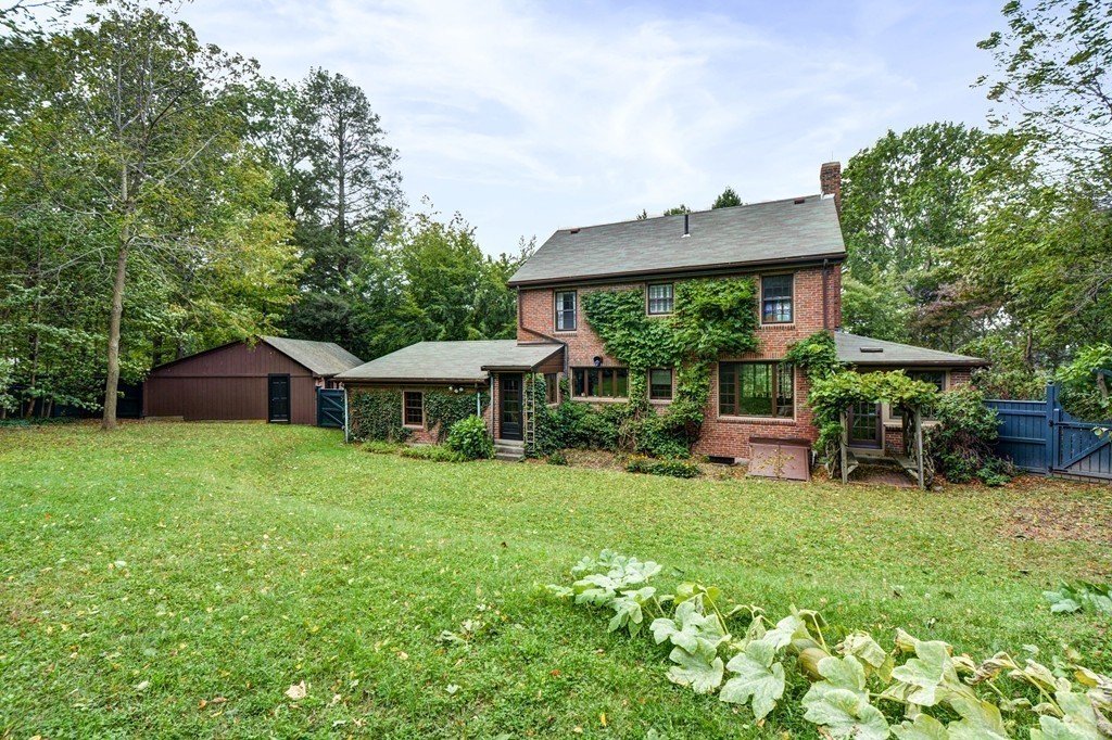 85 Forbes Road Milton, MA 02186 - Photo 2 of 30 a view of a house with a yard porch and sitting area