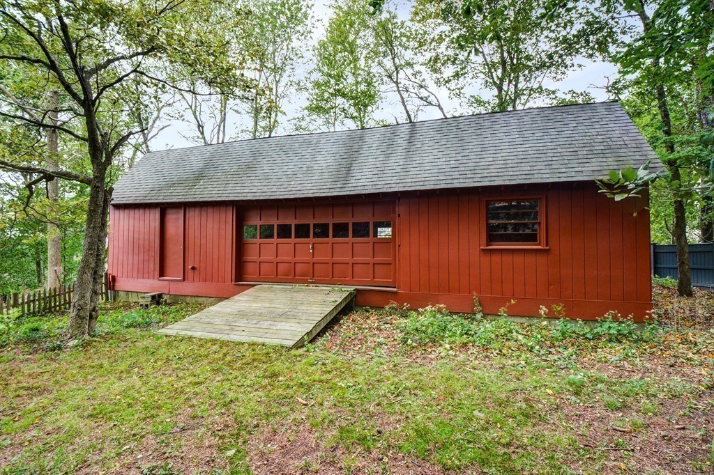 85 Forbes Road Milton, MA 02186 - Photo 28 of 30 a house with tree in front of it