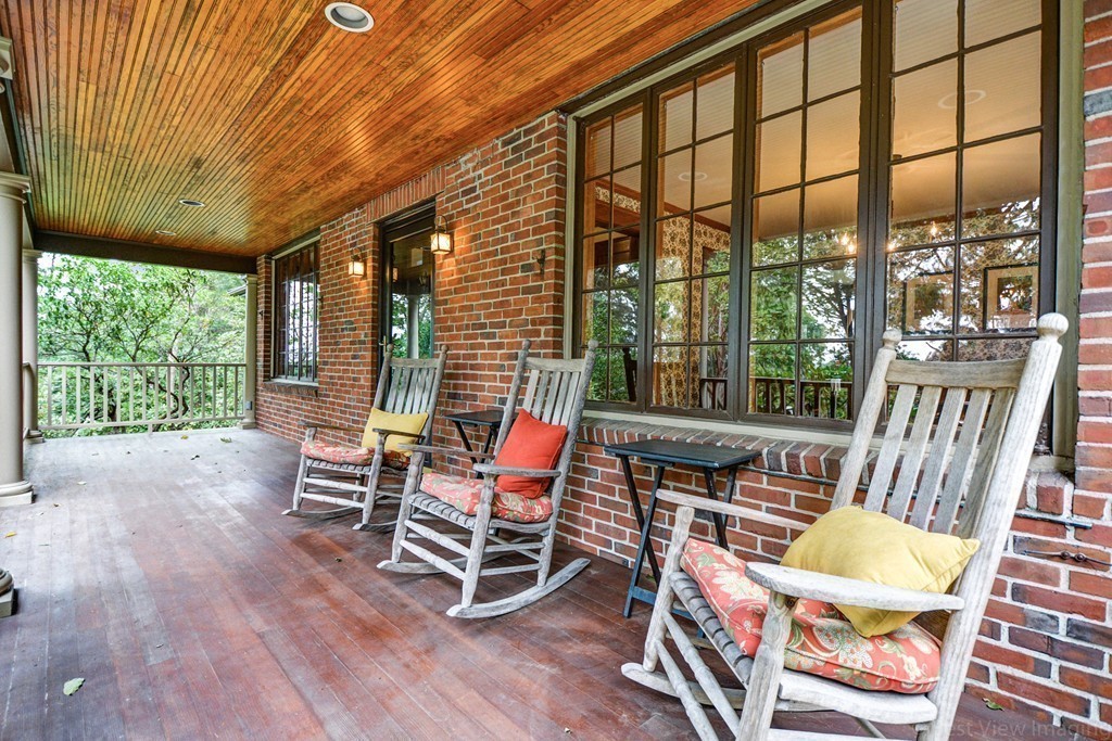 85 Forbes Road Milton, MA 02186 - Photo 3 of 30 a outdoor space with lots of chairs and furniture
