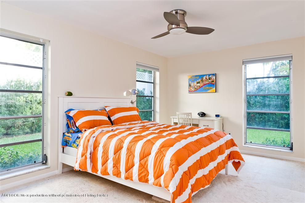 110 Seagate Road Palm Beach, FL 33480 - Photo 6 of 14 a bedroom with a bed and a window