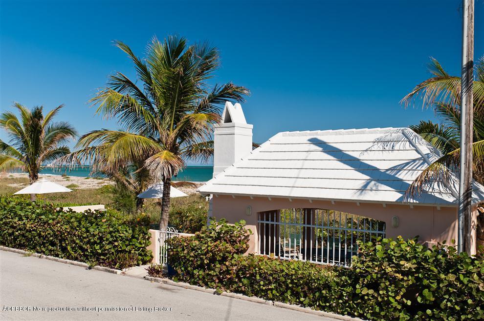110 Seagate Road Palm Beach, FL 33480 - Photo 10 of 14 a front view of a house with a garden