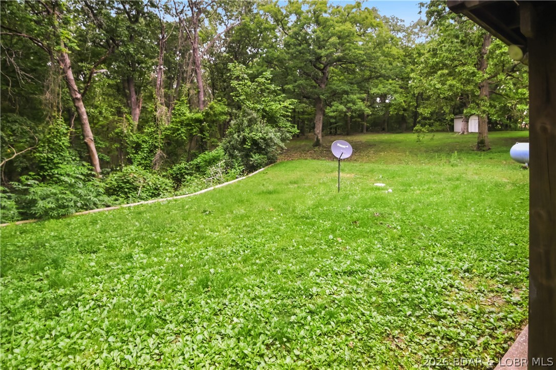 29 Prater Road Eldon, MO 65026 - Photo 8 of 41 Single Car garage and 3 car garage offering plenty