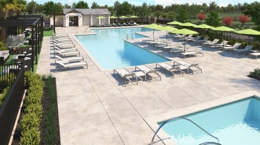 33365 Rusty Court French Valley, CA 92596 - Photo 7 of 9 a view of a swimming pool with a patio