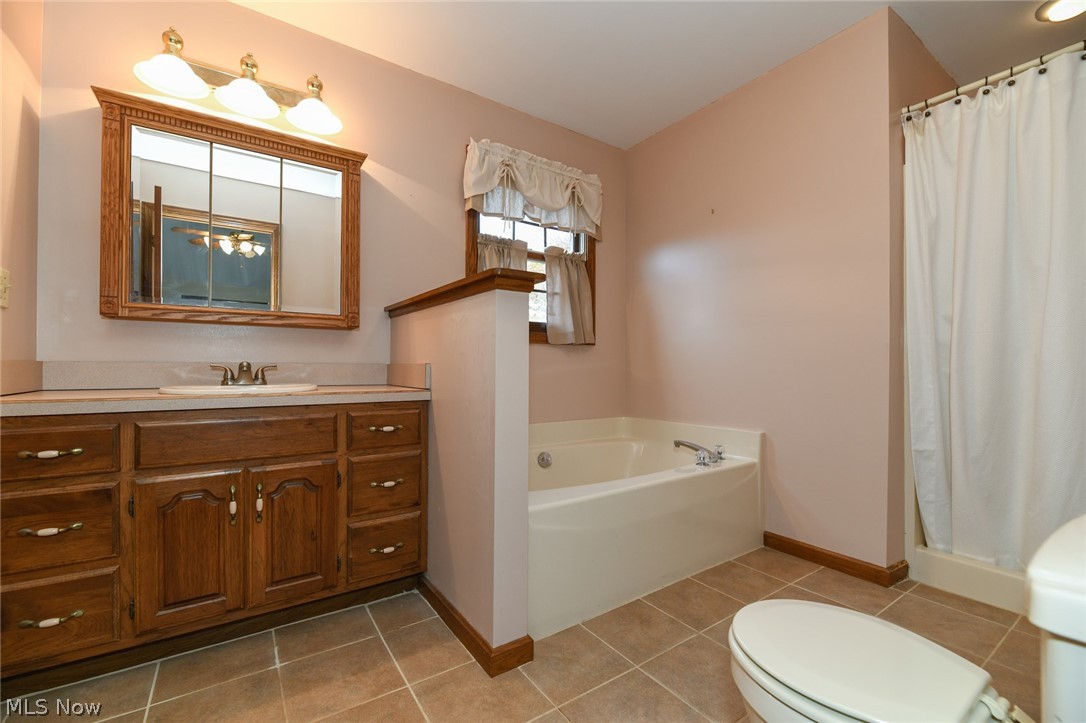 4634 Young Road Stow, OH 44224 - Photo 19 of 35 Ensuite master bath with soaking tub and separate walk-in shower.