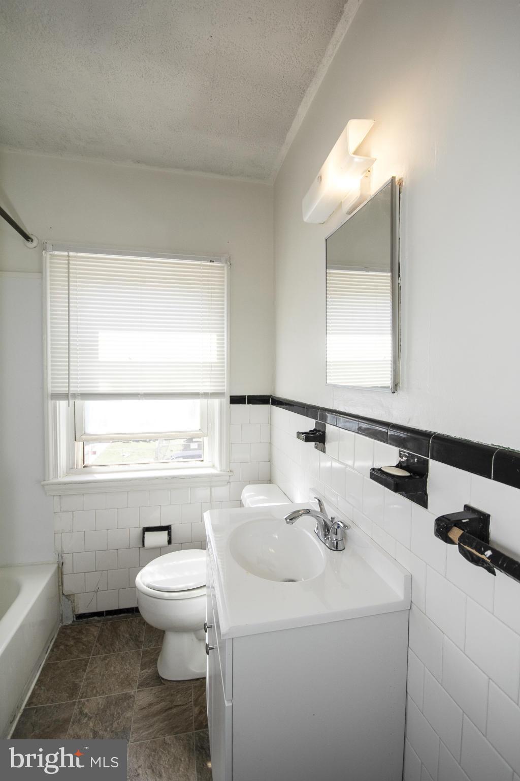 6424 Bushey Street Baltimore, MD 21224 - Photo 14 of 19 Upstairs Bath