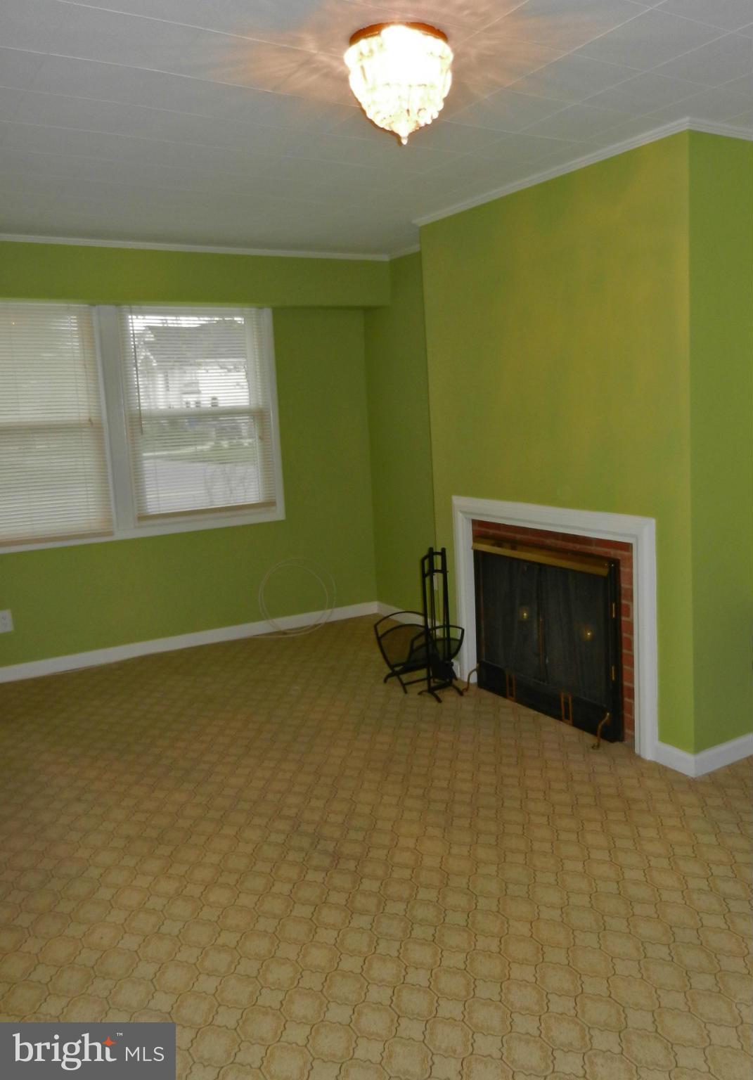 6609 Edsall Road Springfield, VA 22151 - Photo 17 of 26 Family Room with wood burning fireplace