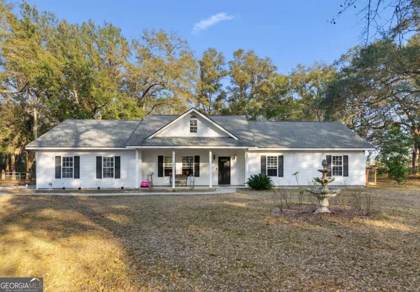 front view of a house with a patio