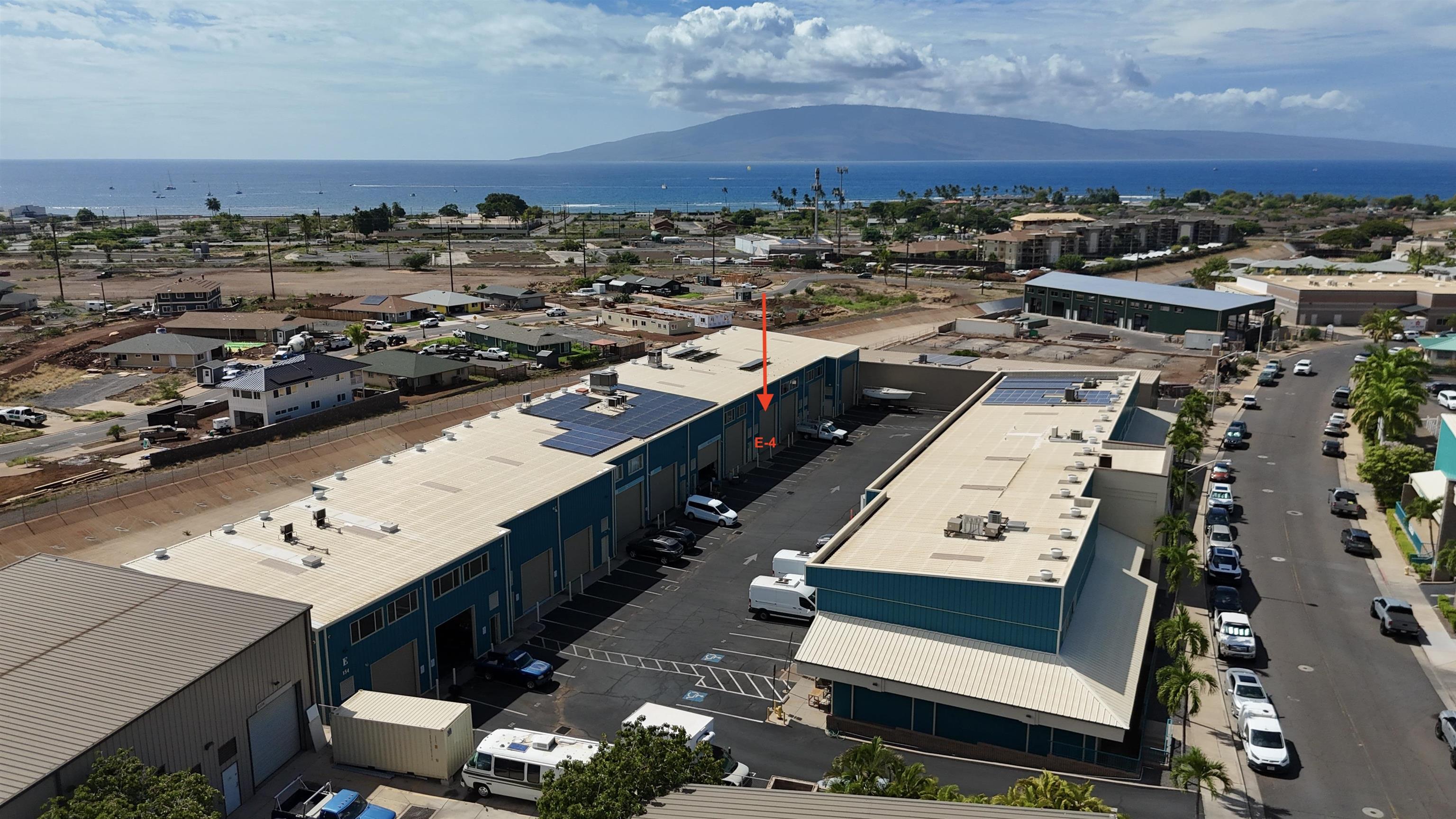 154 Kupuohi Street, Unit E4 Lahaina, HI 96761 - Photo 2 of 9 an aerial view of a residential houses with city view