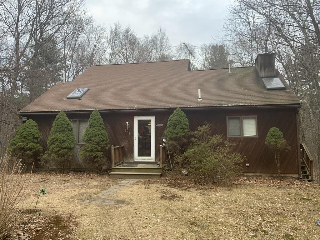 154 Cutler Road Warren, MA 01083 - Photo 1 of 1 a front view of a house with garden