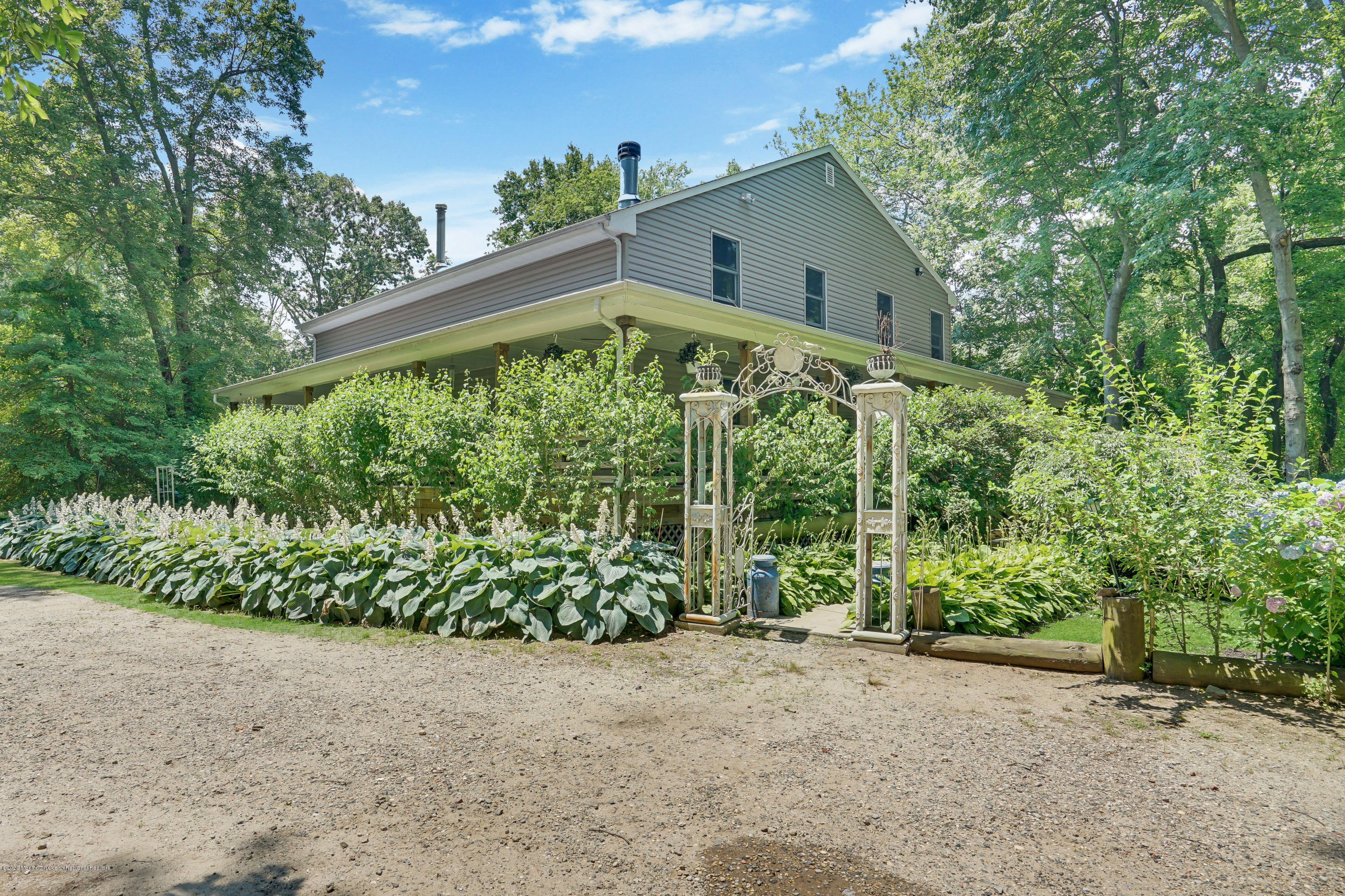 60 Oak Glen Road Howell, NJ 07731 - Photo 40 of 74 a front view of a house with a yard