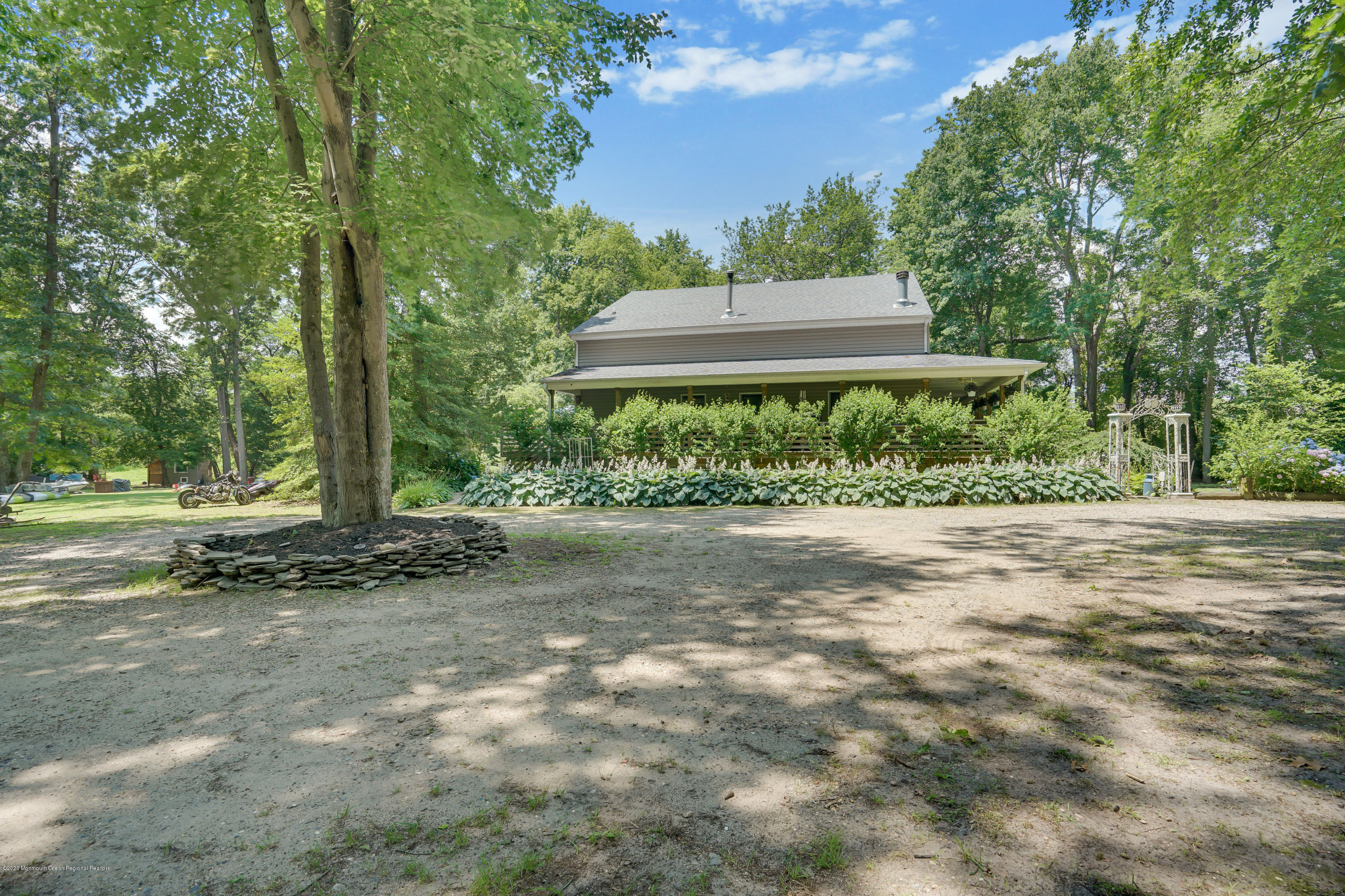 60 Oak Glen Road Howell, NJ 07731 - Photo 57 of 74 a front view of a house with a yard