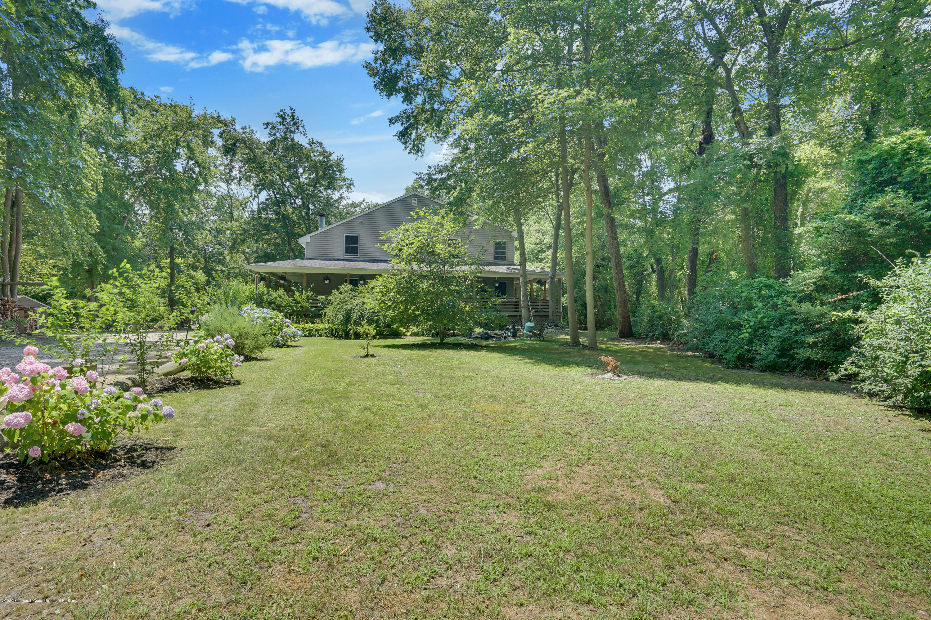 60 Oak Glen Road Howell, NJ 07731 - Photo 60 of 74 a view of a yard with plants and large trees