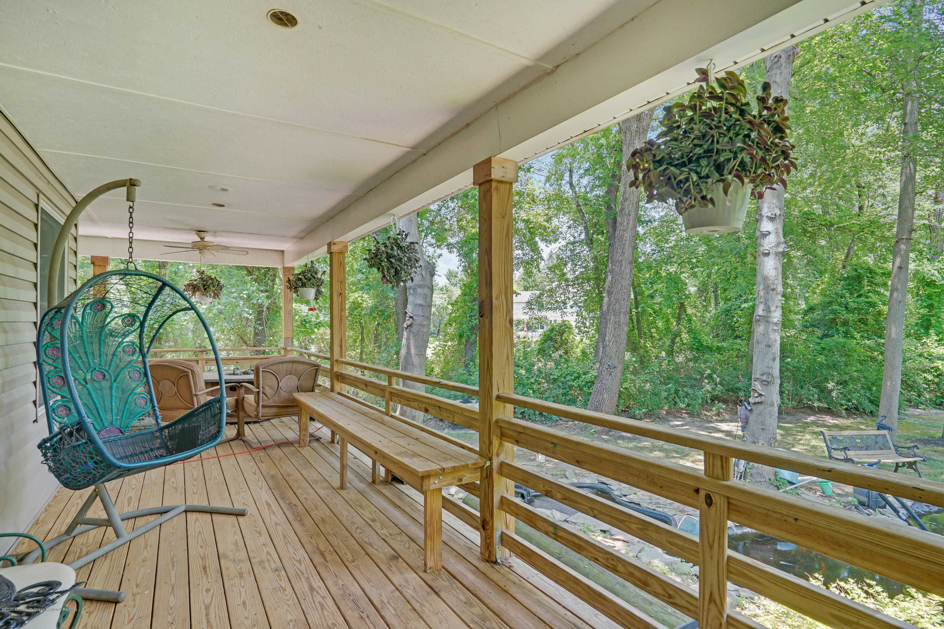 60 Oak Glen Road Howell, NJ 07731 - Photo 66 of 74 a view of a balcony with chairs