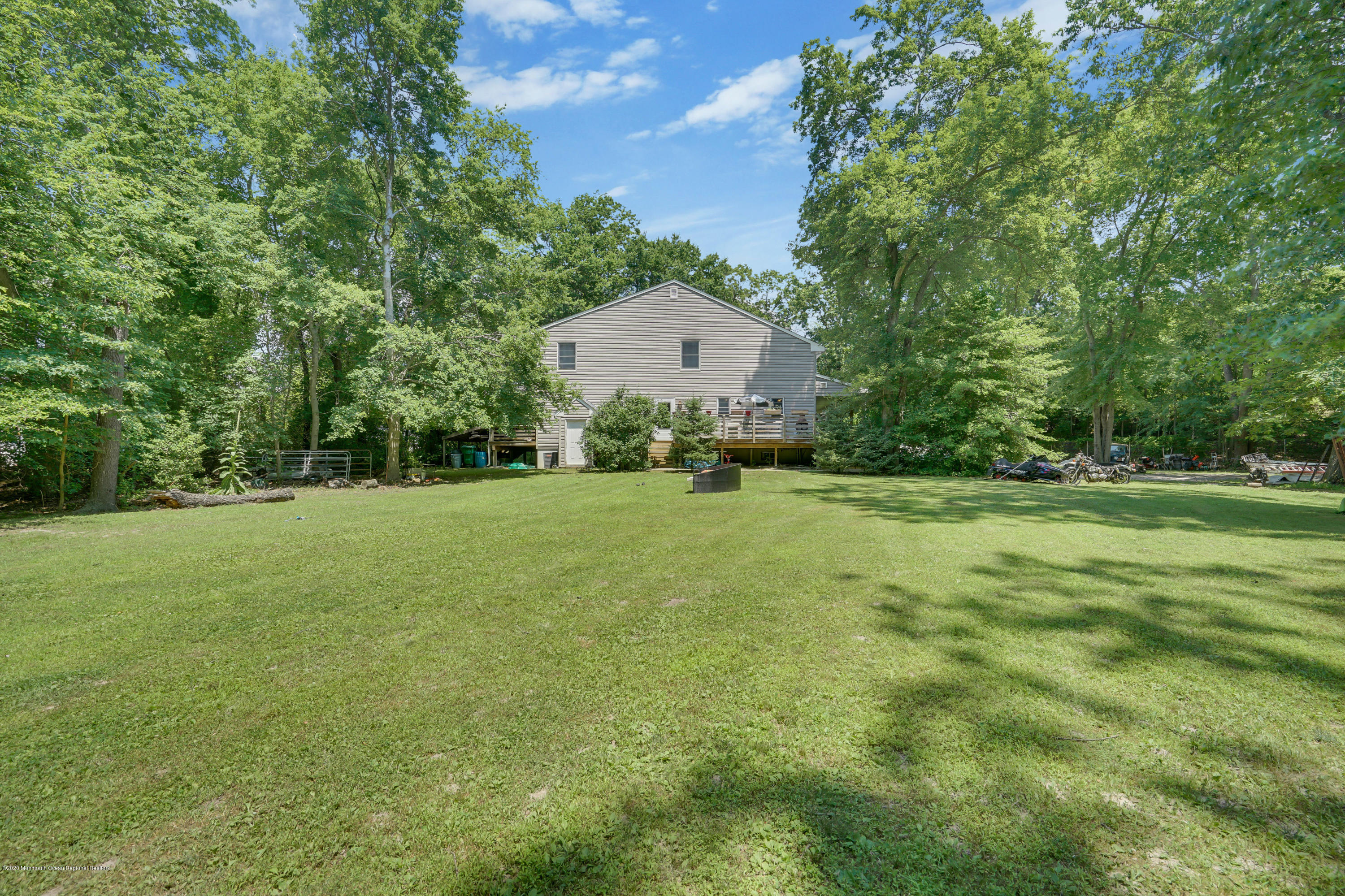 60 Oak Glen Road Howell, NJ 07731 - Photo 72 of 74 a backyard of a house with lots of green space