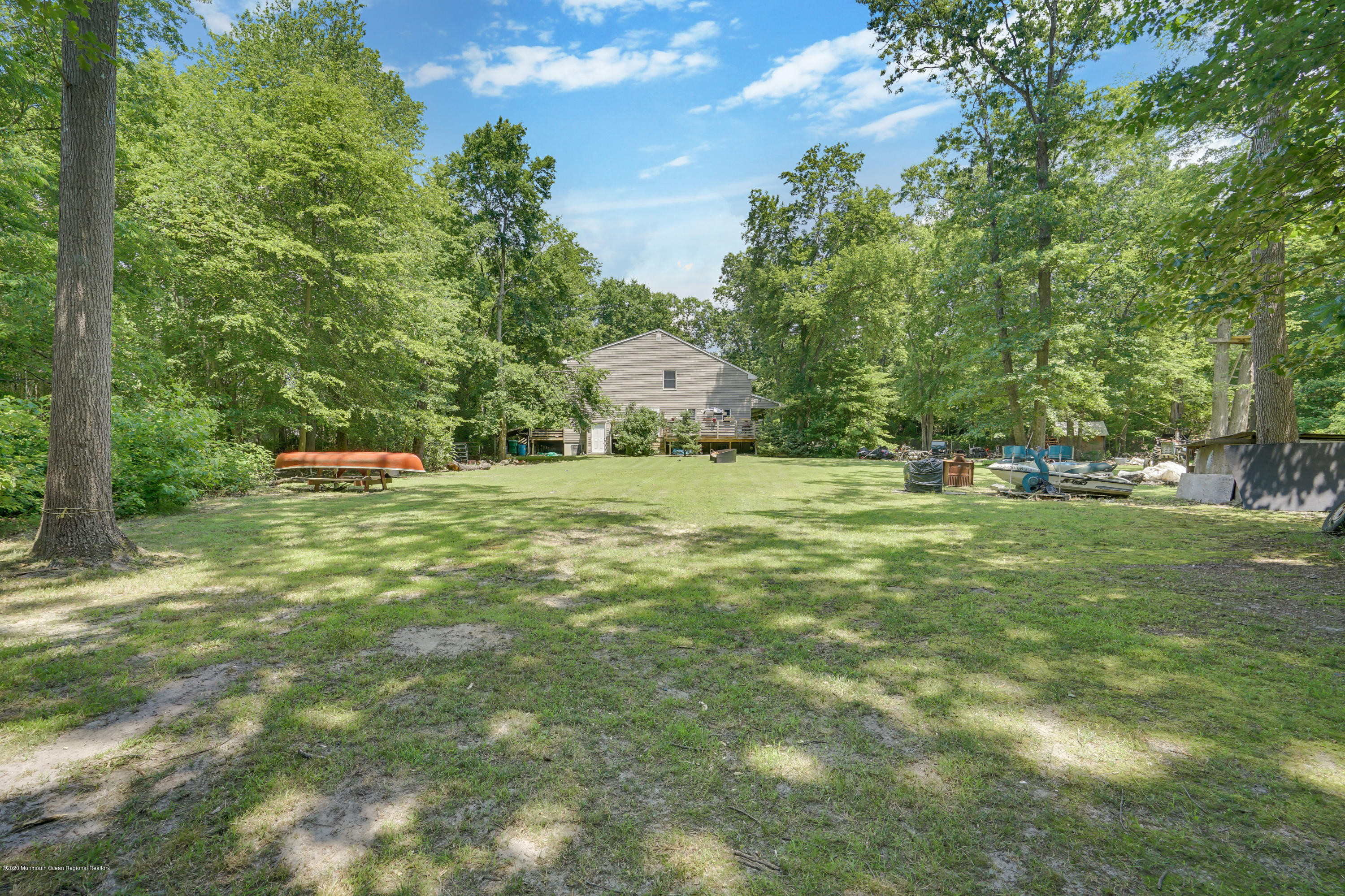 60 Oak Glen Road Howell, NJ 07731 - Photo 73 of 74 a big yard with lots of green space and plants