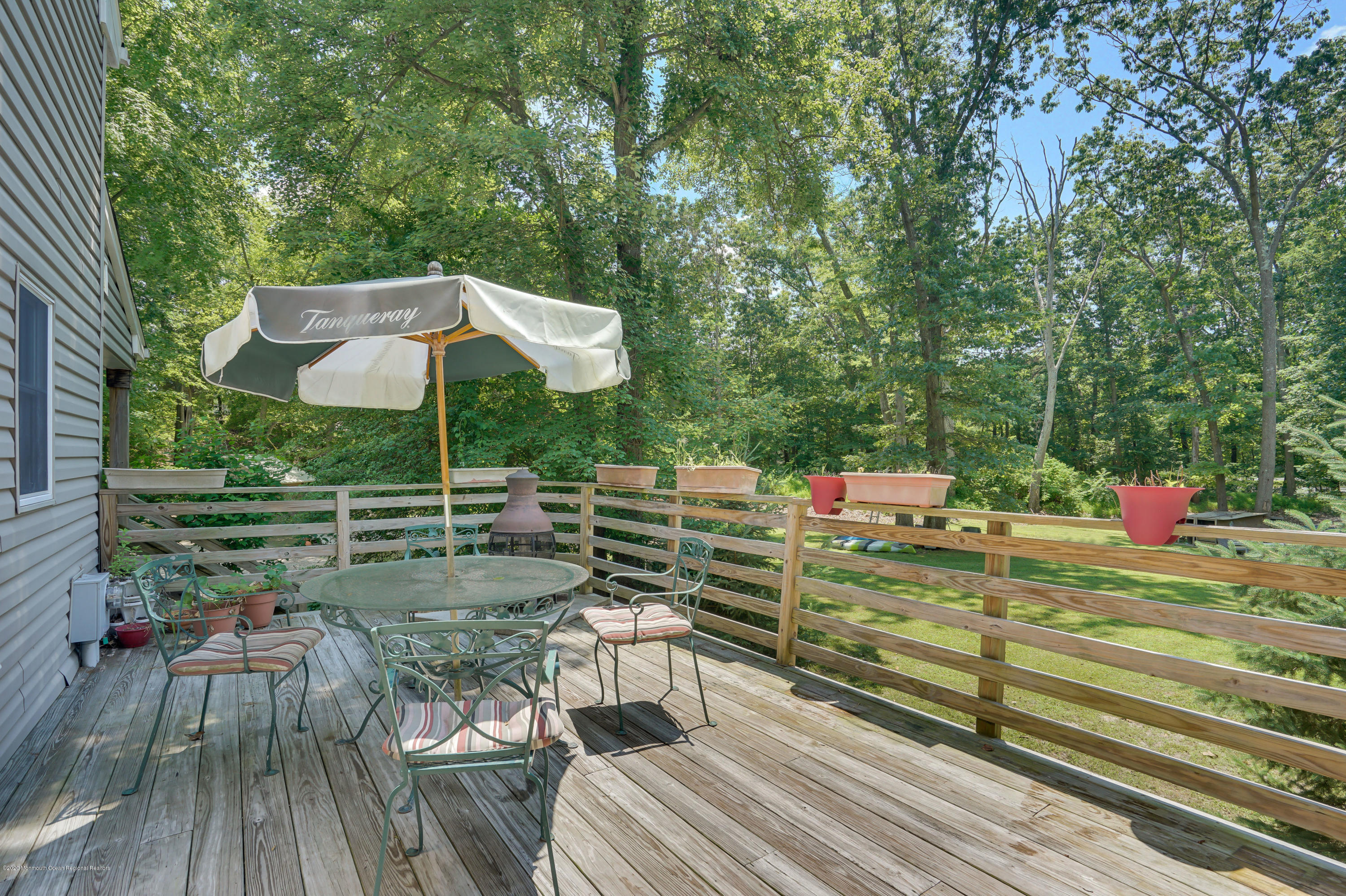60 Oak Glen Road Howell, NJ 07731 - Photo 74 of 74 a view of a chairs and table in the patio