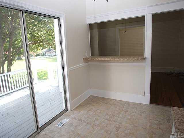 1707 Bahama Road Bahama, NC 27503 - Photo 6 of 10 Enjoy Relaxing on the Nice Large Deck Leading from the Light-filled Kitchen Kitchen