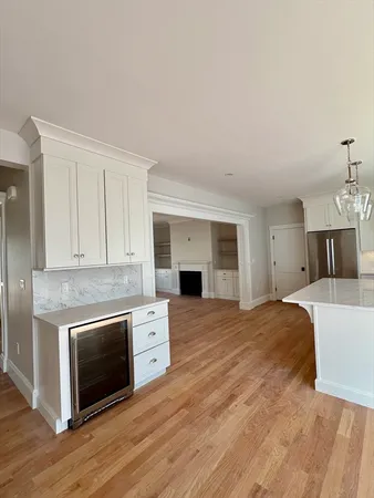 a bedroom with a bed and a fireplace