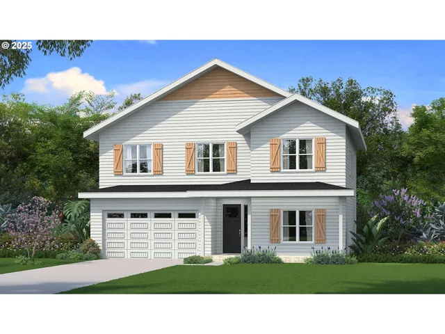 a black and white house with a yard