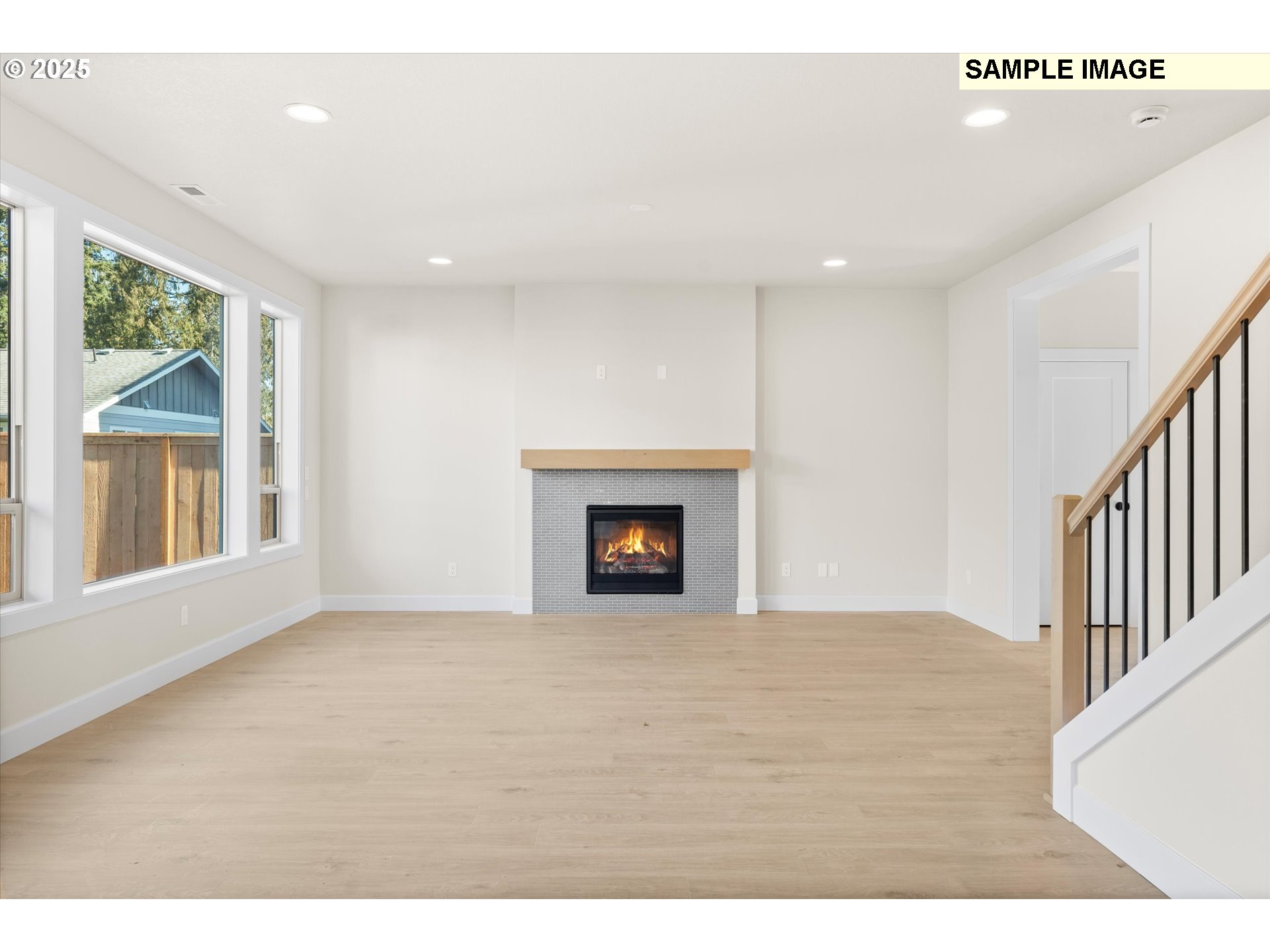1241 Rachel Lane Molalla, OR 97038 - Photo 6 of 9 a view of an empty room with a window and fireplace