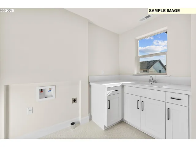 a bathroom with a sink a mirror and a window