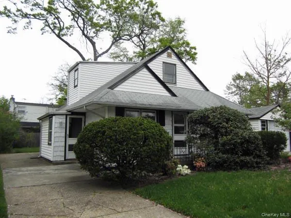$999,000 | 446 Howard Avenue, Woodmere, NY 11598