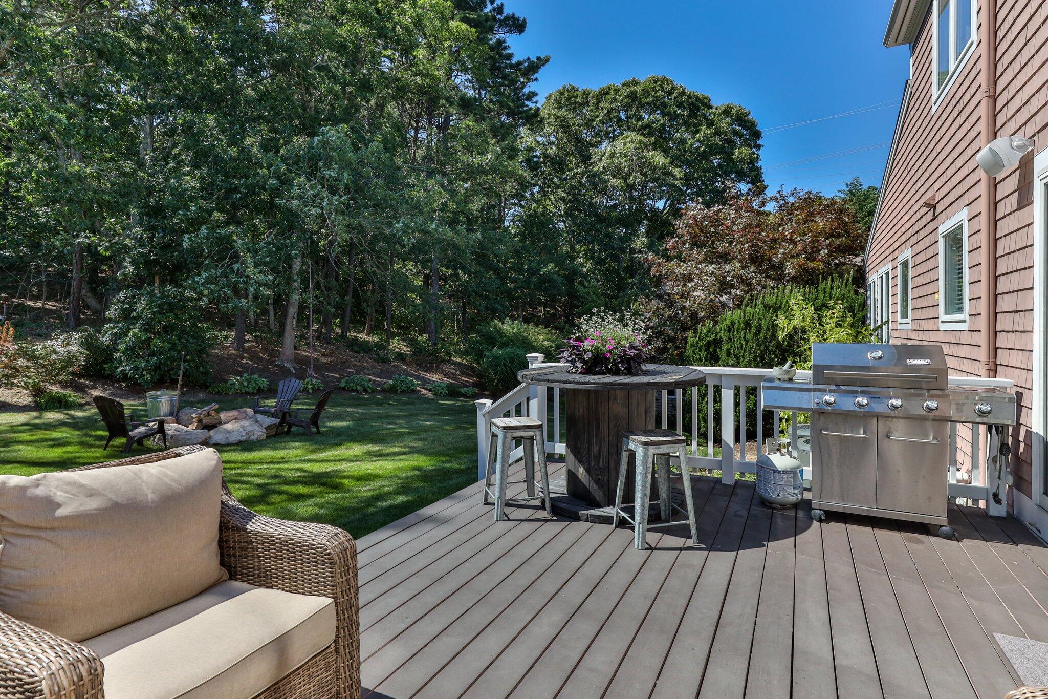104 Owl Pond Road Brewster, MA 02631 - Photo 12 of 58 104 Owl Pond Deck & Fire Pit