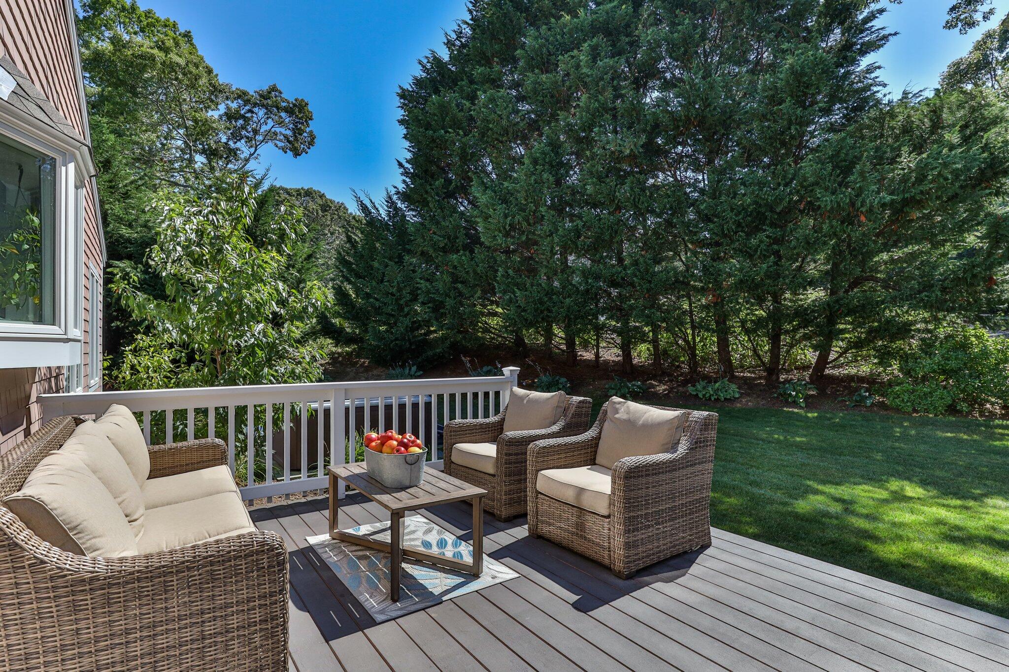 104 Owl Pond Road Brewster, MA 02631 - Photo 14 of 58 104 Owl Pond Seating Area on Deck