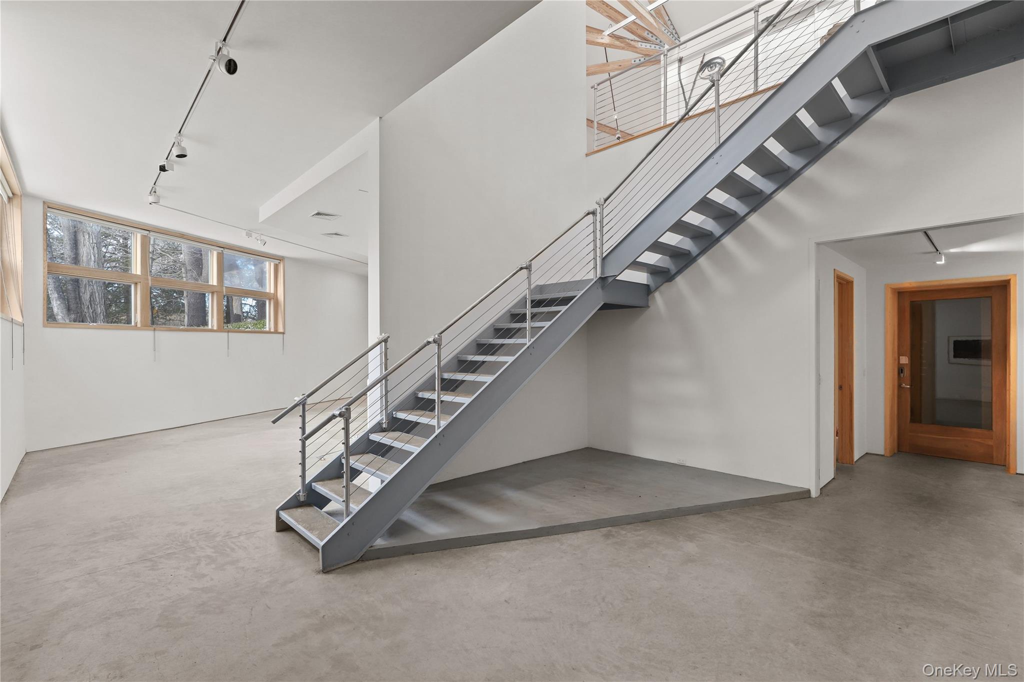 64 Pound Ridge Road Pound Ridge, NY 10576 - Photo 11 of 25 To the lower level