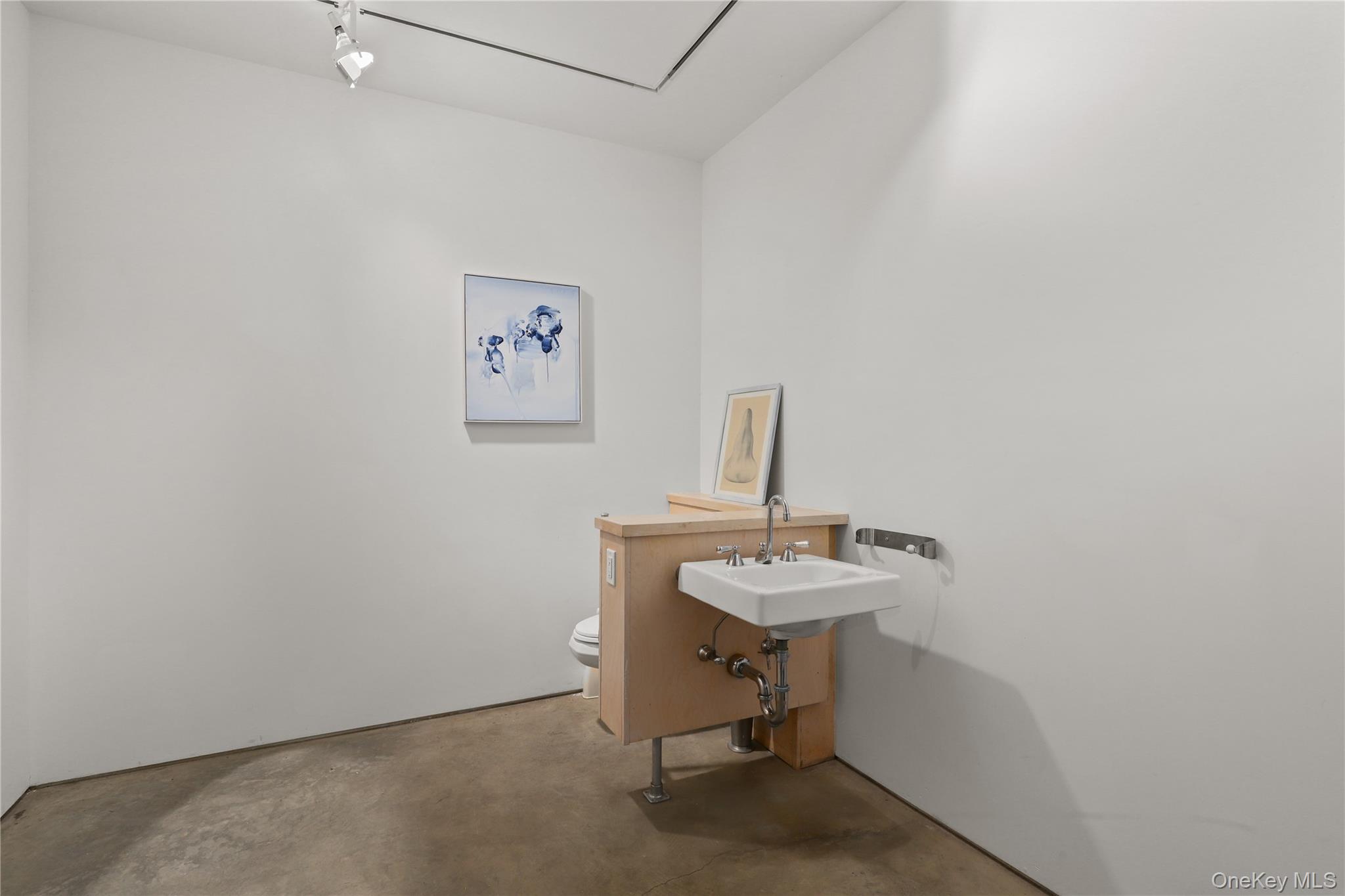 64 Pound Ridge Road Pound Ridge, NY 10576 - Photo 13 of 25 Powder Room lower level. Easy to convert to full bath.