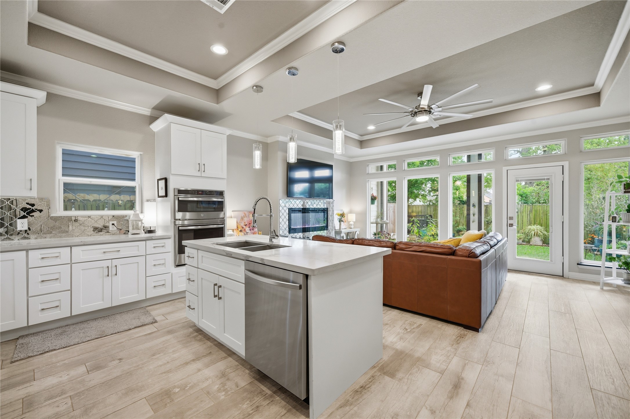 4412 New Orleans Street, Unit B Houston, TX 77020 - Photo 10 of 42 The kitchen overlooks the living room, with coffered ceilings and crown molding in each area, along with lovely tile floors