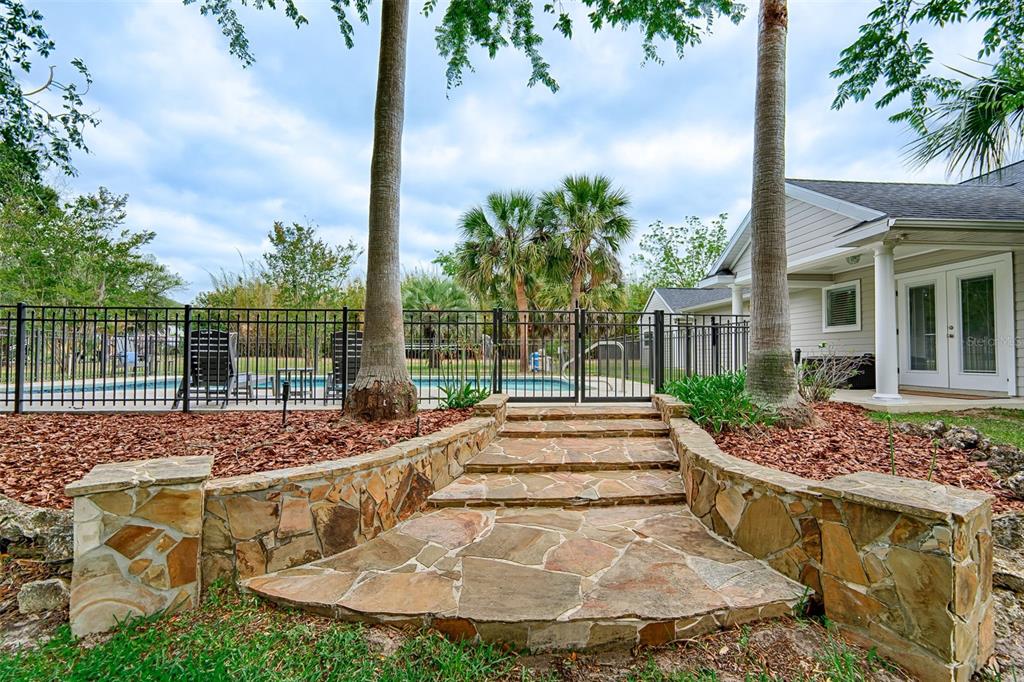 10912 Southwest 17 Lane Gainesville, FL 32607 - Photo 3 of 67 a view of a house with backyard and sitting area