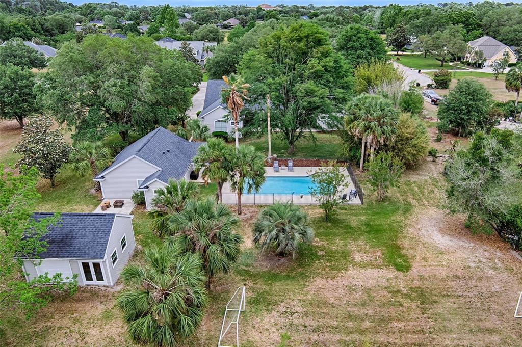 10912 Southwest 17 Lane Gainesville, FL 32607 - Photo 56 of 67 an aerial view of a house with a yard