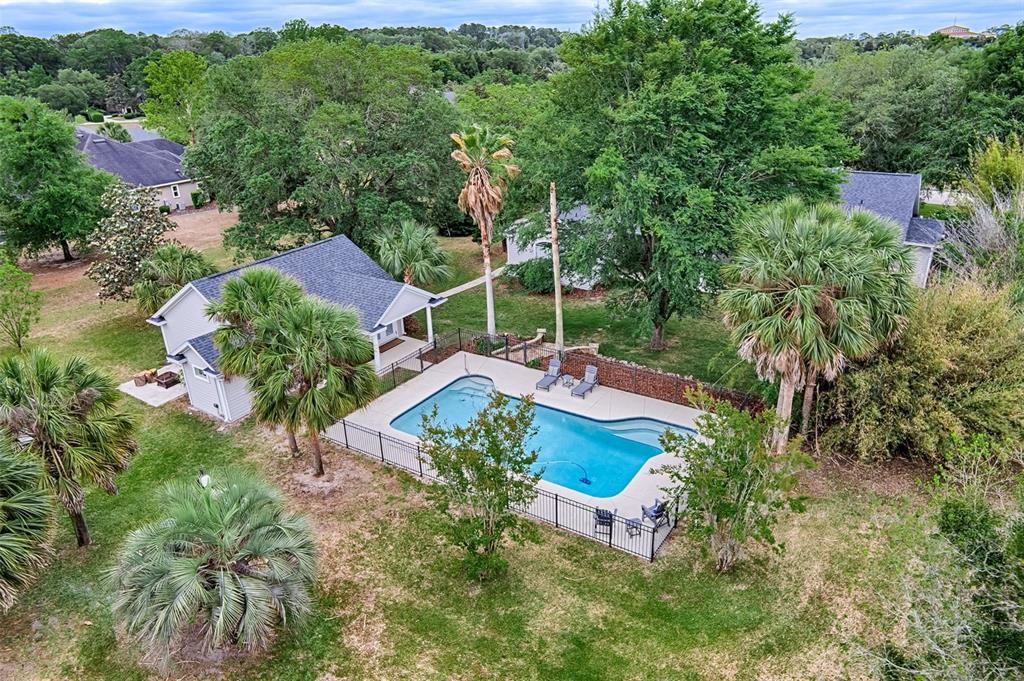 10912 Southwest 17 Lane Gainesville, FL 32607 - Photo 59 of 67 an aerial view of a house with a yard