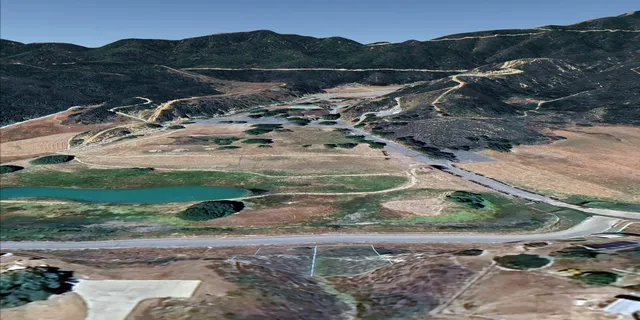 a picture of a bathroom with a window and shower