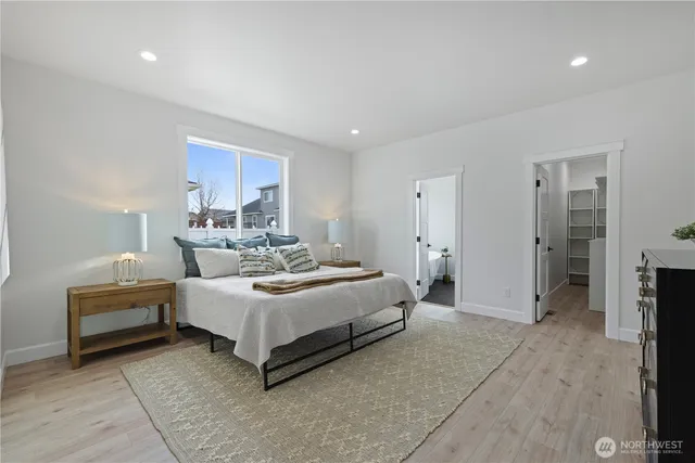 a bed room with a bed and a couch